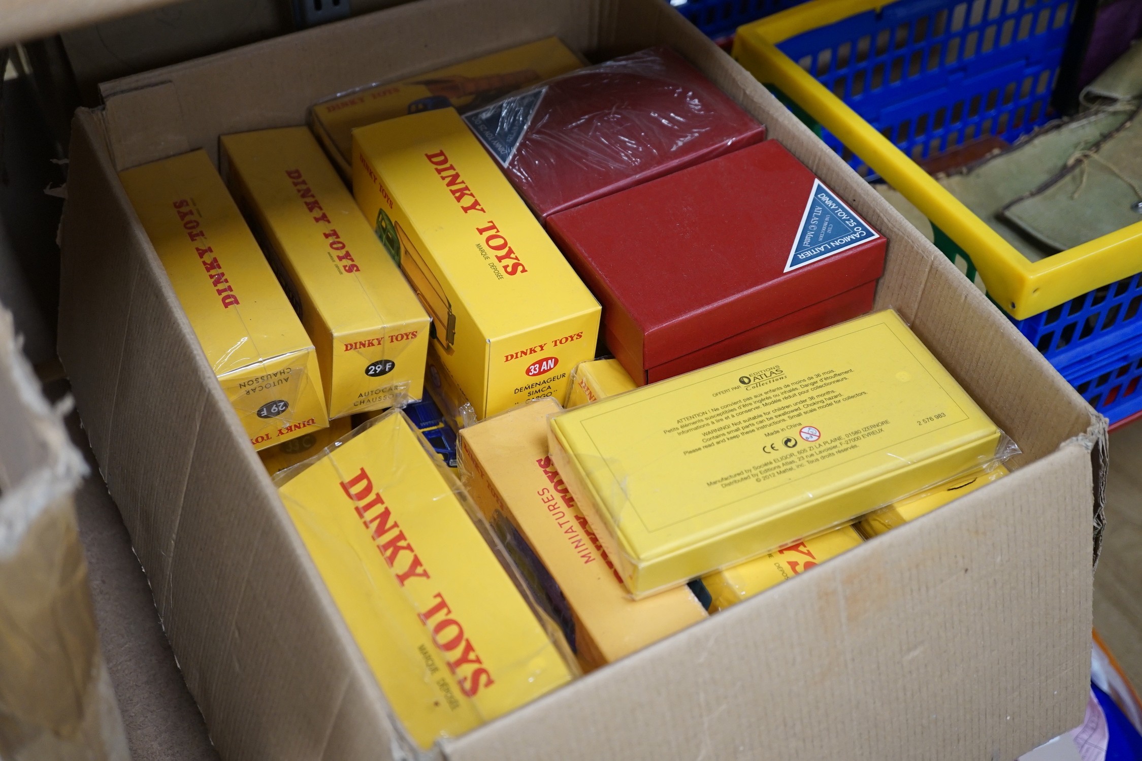 A large quantity of Norev (reproduction) boxed dinky lorries, vans, road sins, petrol pump, etc